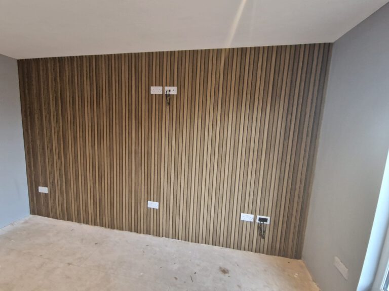Bedroom feature wall in wood-effect panel wallpaper